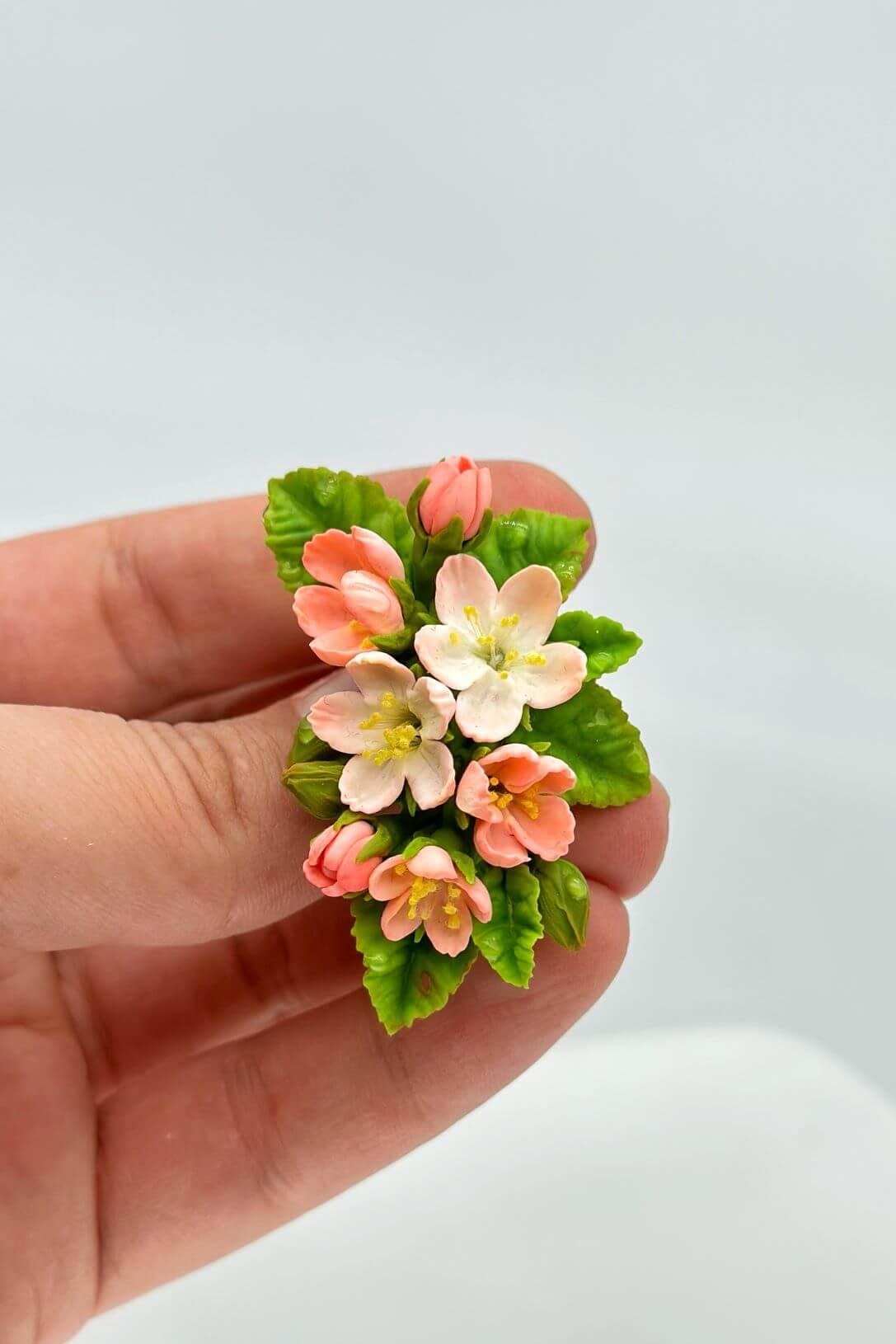 Handmade polymer clay Apple Blossom Flower Brooch Pin, a unique wearable art piece by ioArtStudio