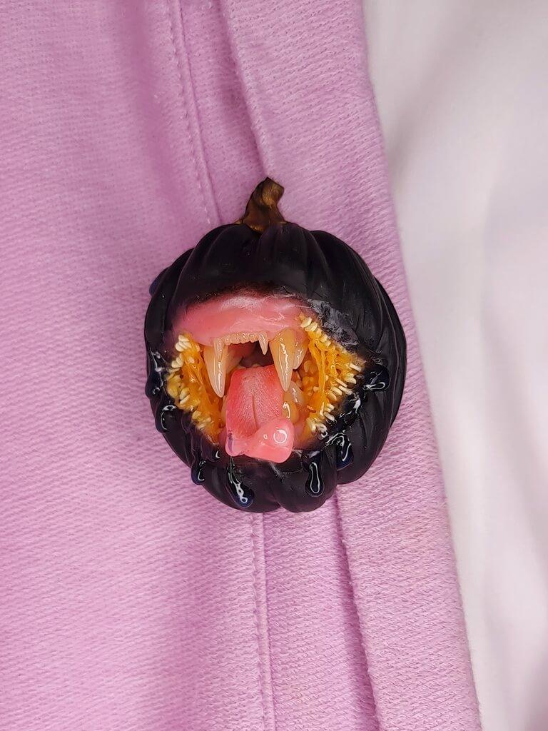 Handmade polymer clay Black Pumpkin With Animal Teeth  Attention-Grabbing Wearable Artwork by ioArtStudio