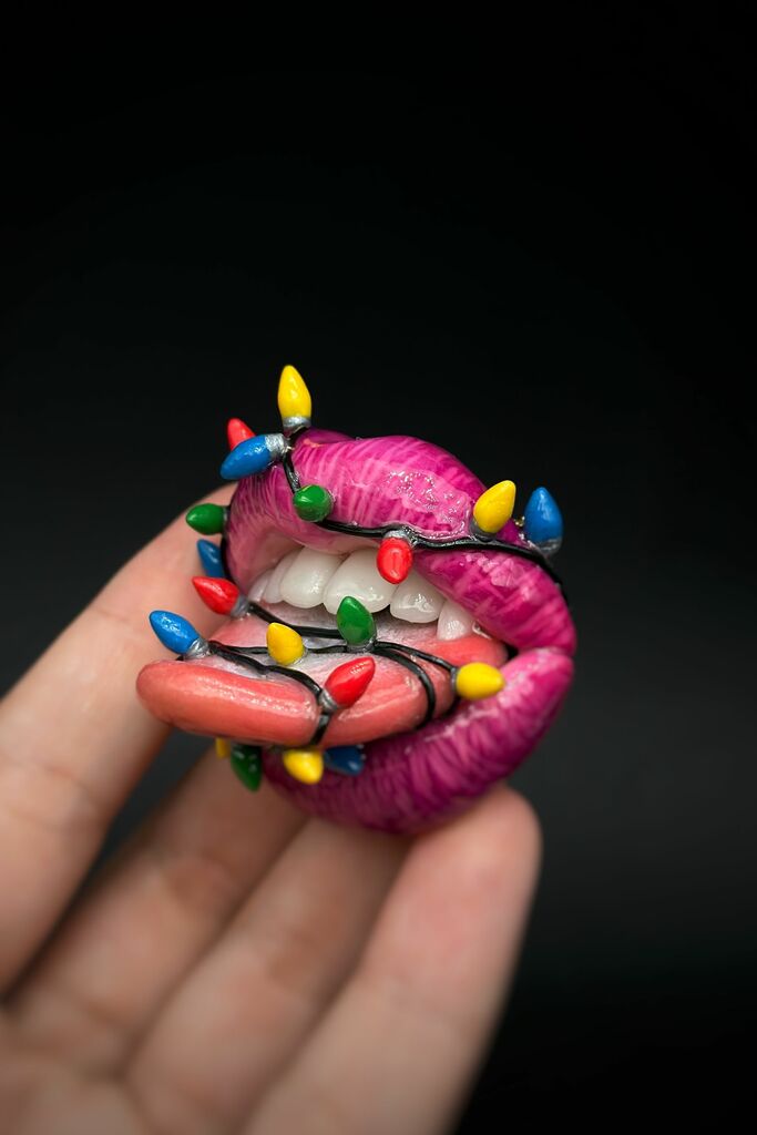 lips with christmas light bulbs around it , Handmade with polymer clay Wearable Artwork by ioArtStudio