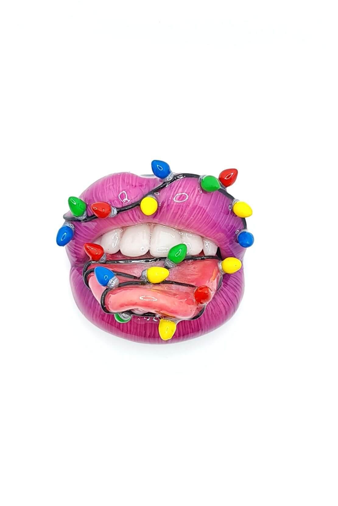  lips with christmas light bulbs around it ,  Handmade with  polymer clay  Wearable Artwork by ioArtStudio