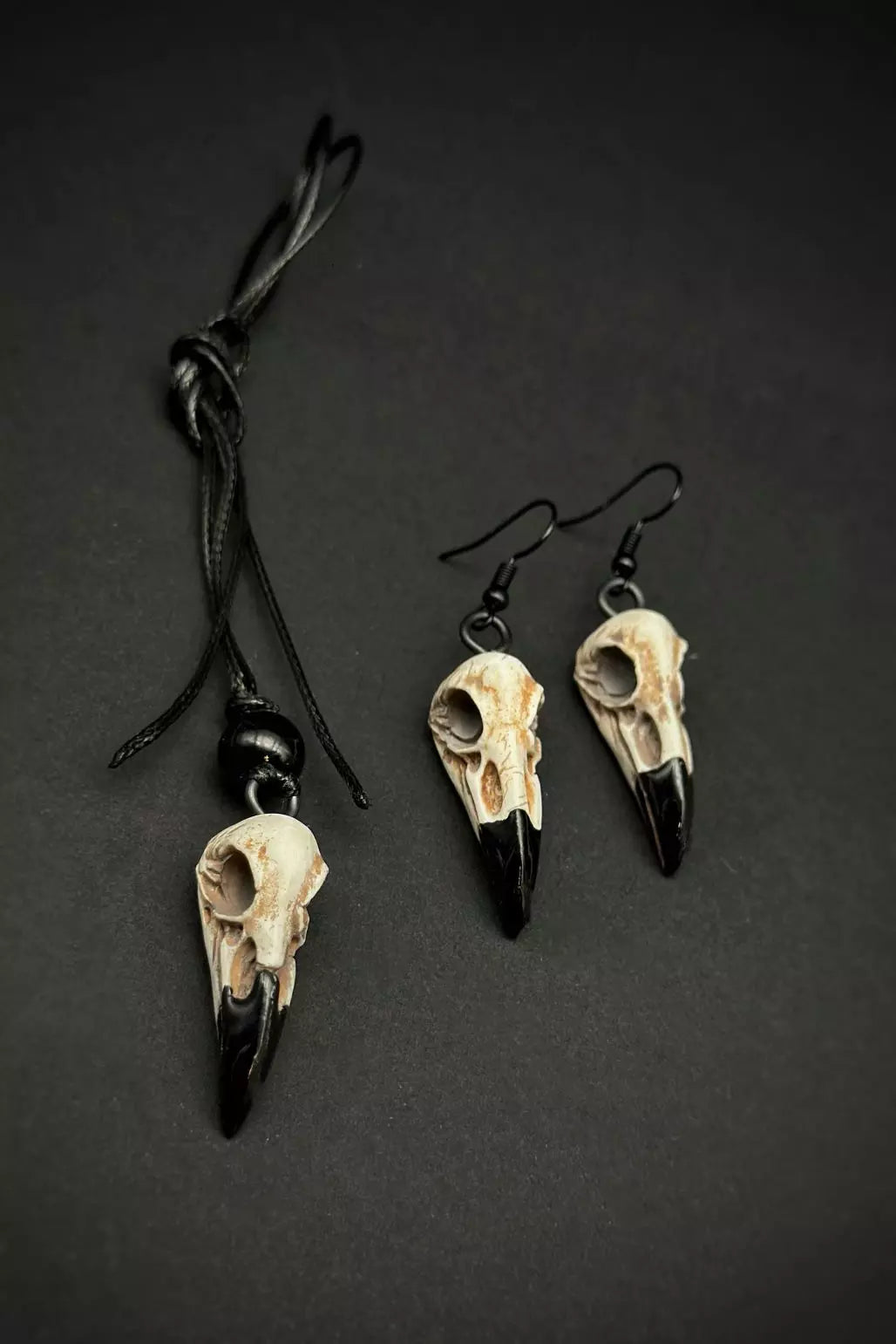 Crow Skull Necklace and Earring Set featuring bird skull pendant, stud and dangle earrings, handmade from polymer clay by ioArtStudio