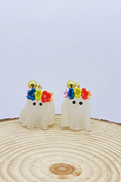 Halloween Ghost Earrings adorned with a flower crown, meticulously handcrafted from polymer clay.  Wearable art by ioartstudio