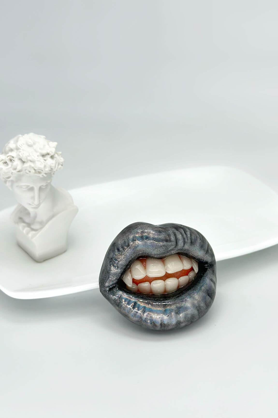 Holographic glitter lips with vampire fangs, hand-sculpted wearable art piece, crafted from polymer clay  by ioArtStudio