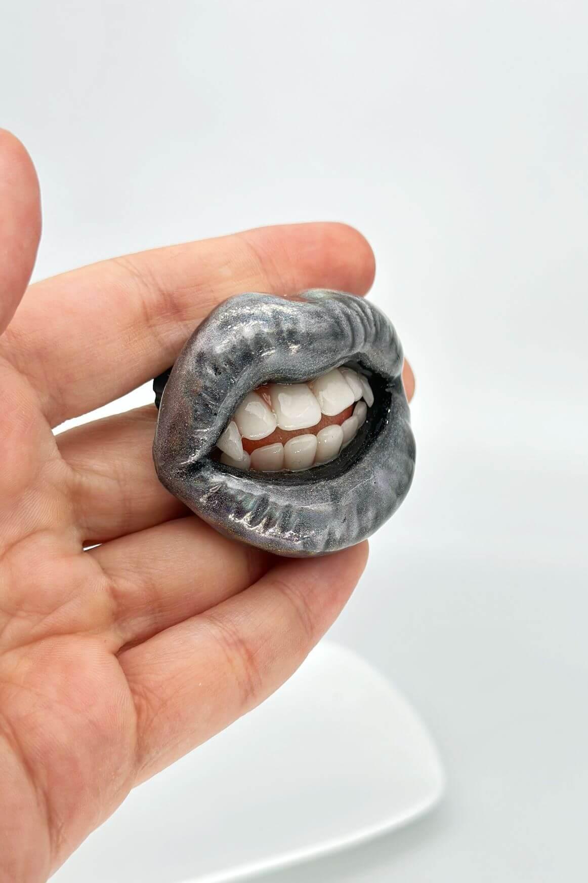 Holographic glitter lips with vampire fangs, hand-sculpted wearable art piece, crafted from polymer clay  by ioArtStudio