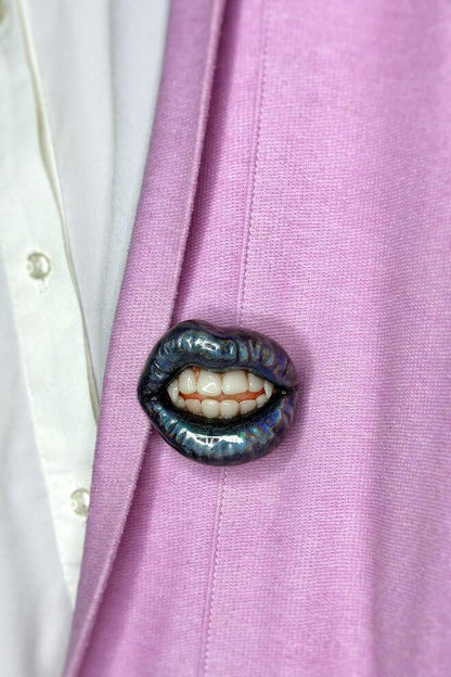 Holographic glitter lips with vampire fangs, hand-sculpted wearable art piece, crafted from polymer clay  by ioArtStudio