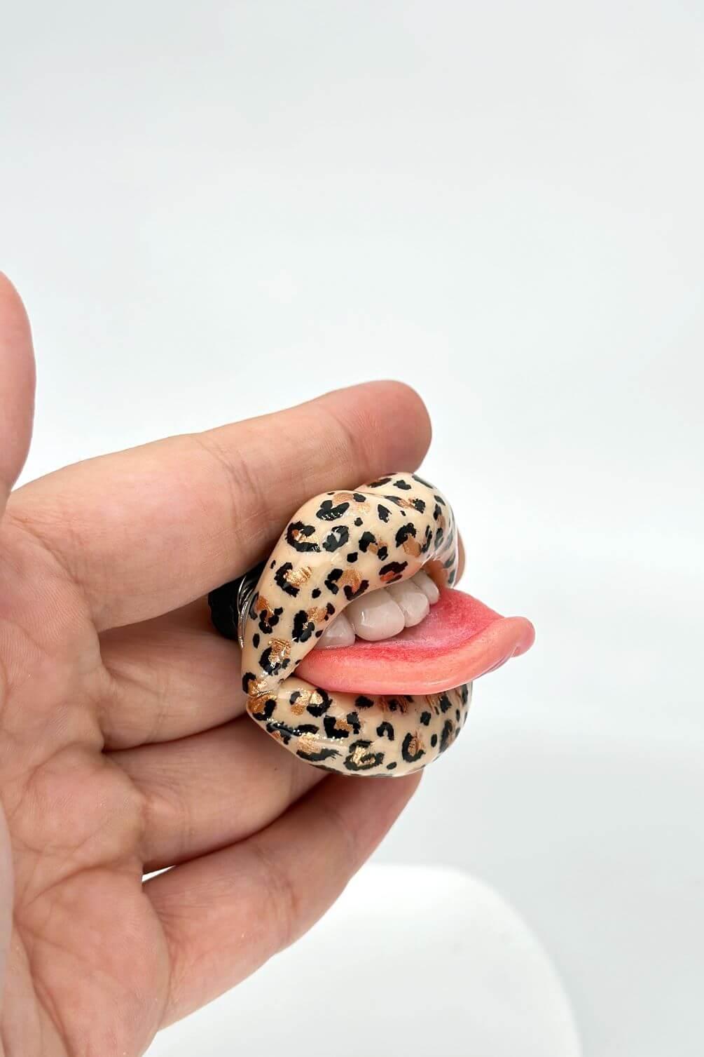 Handmade leopard print lips with tongue hand sculpted by Polymer Clay, a fun and stylish accessory by ioArtStudio