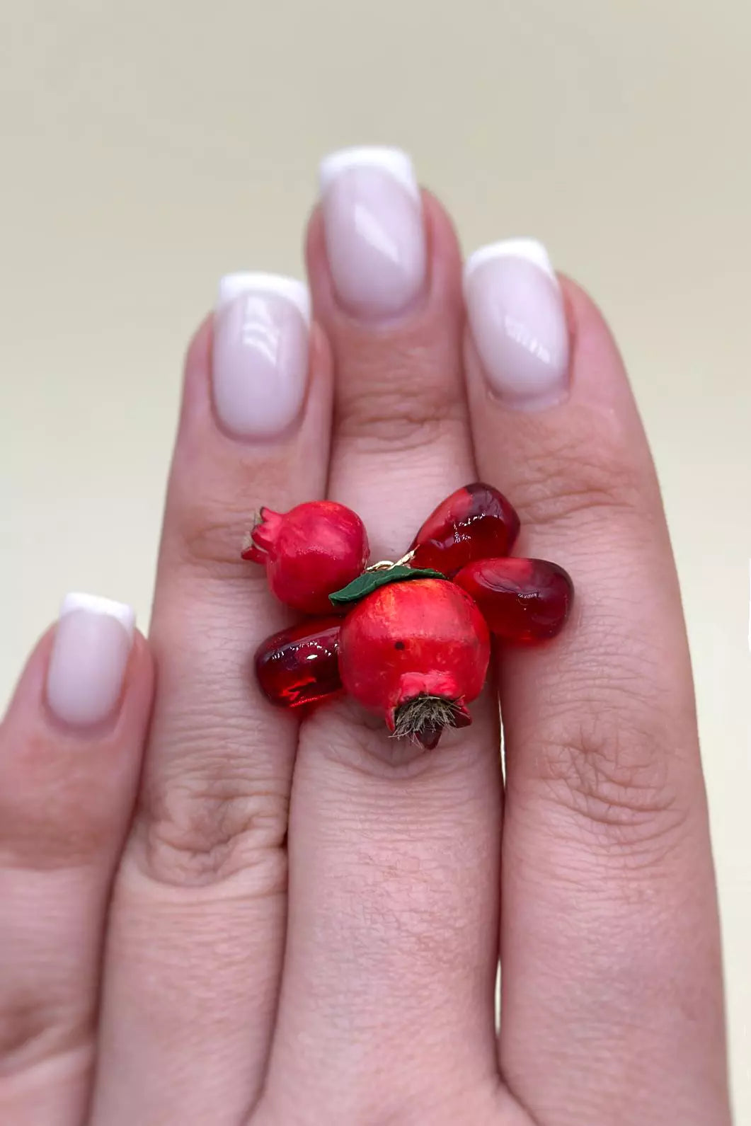 Handmade polymer clay Pomegranate Adjustable Ring, a unique and eye-catching wearable art by ioArtStudio