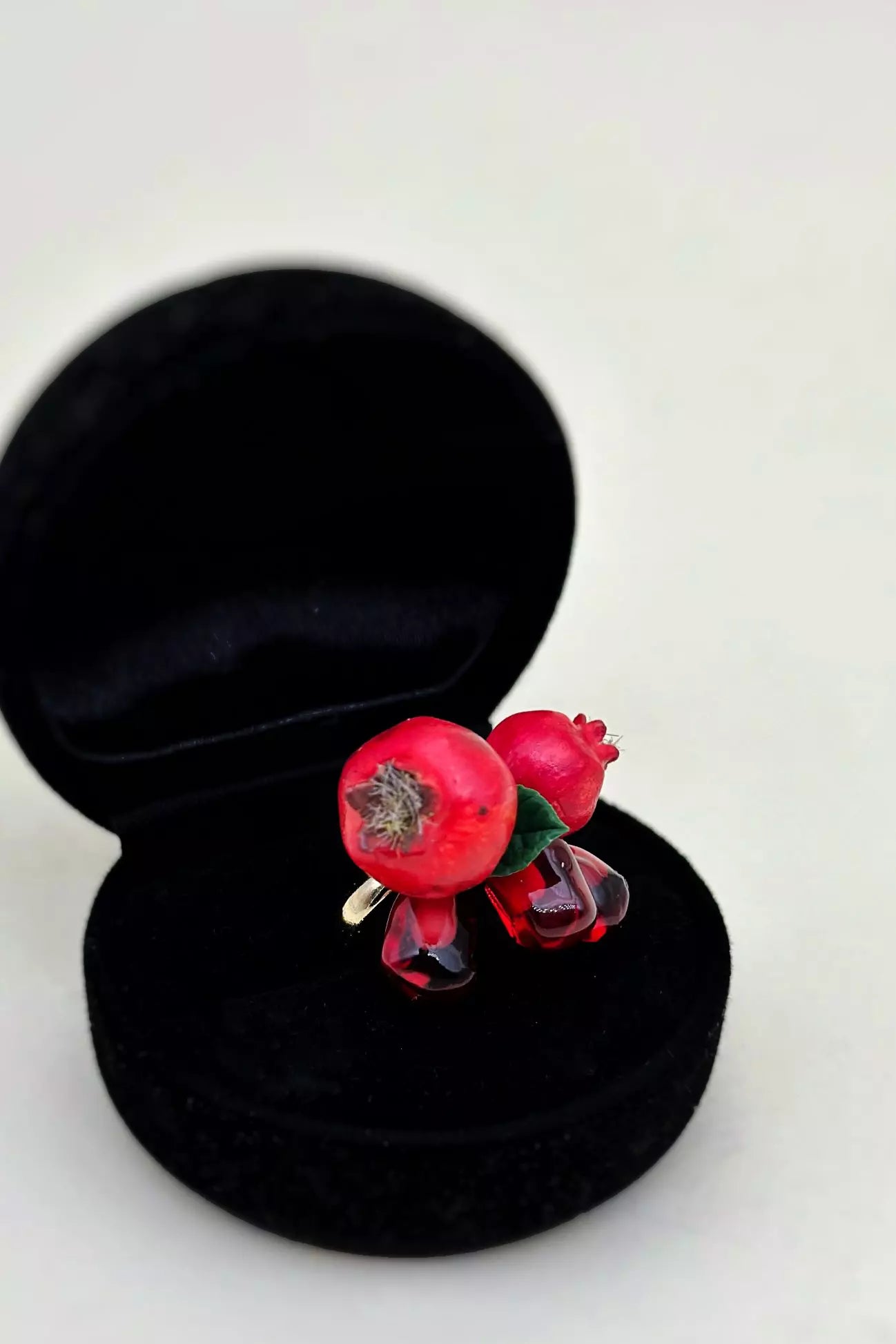 Handmade polymer clay Pomegranate Adjustable Ring, a unique and eye-catching wearable art by ioArtStudio