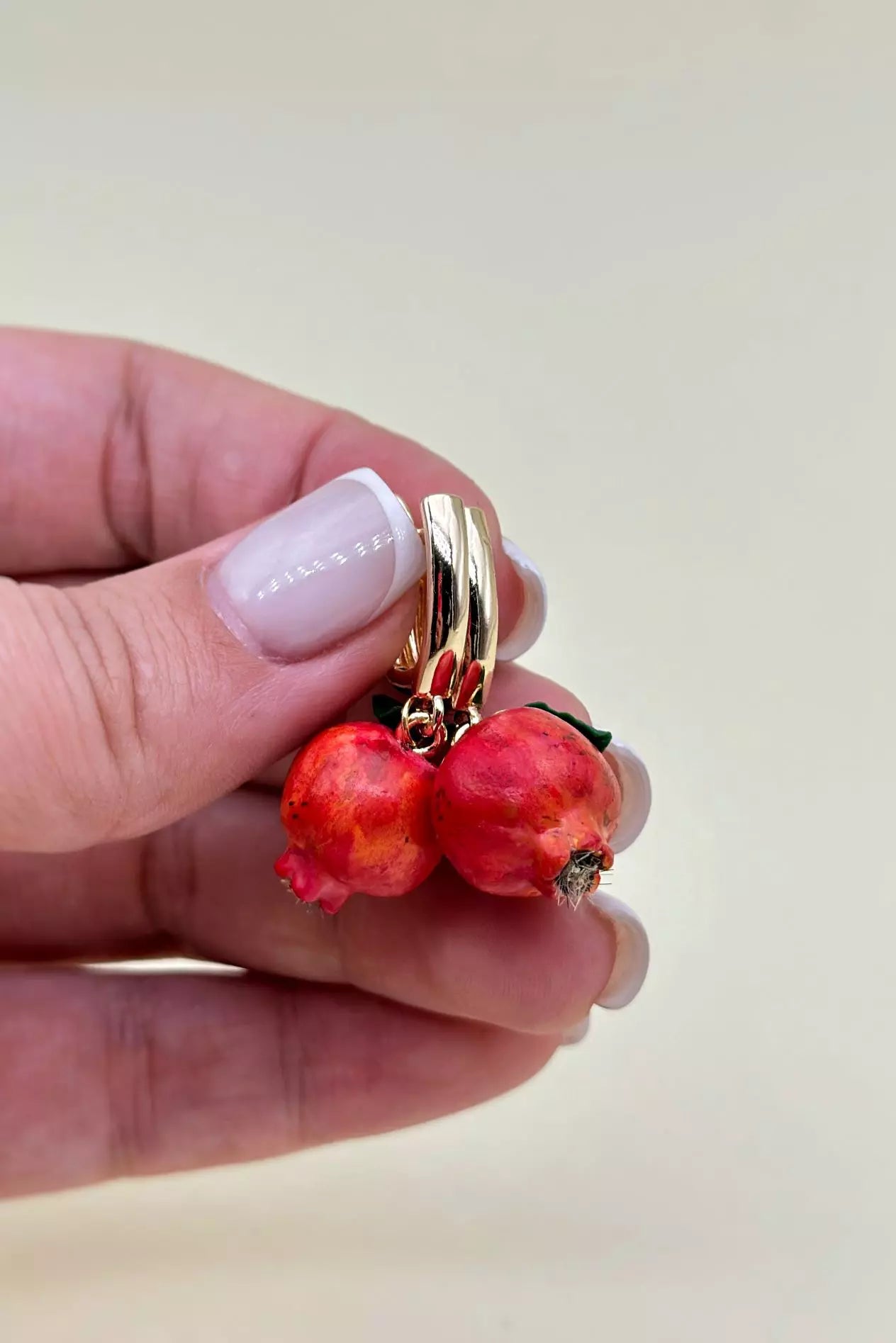 Handmade polymer clay Pomegranate Dangle Earrings, a unique and eye-catching wearable art by ioArtStudio