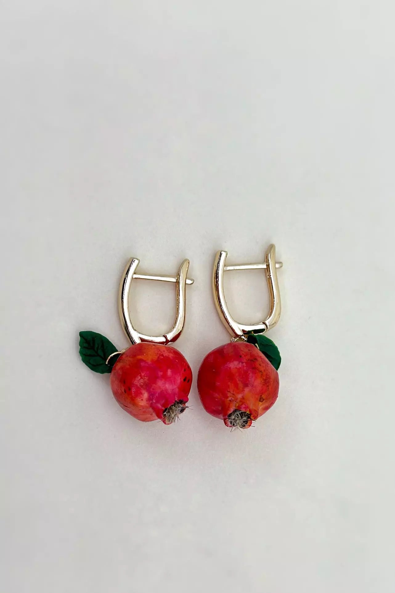 Handmade polymer clay Pomegranate Dangle Earrings, a unique and eye-catching wearable art by ioArtStudio