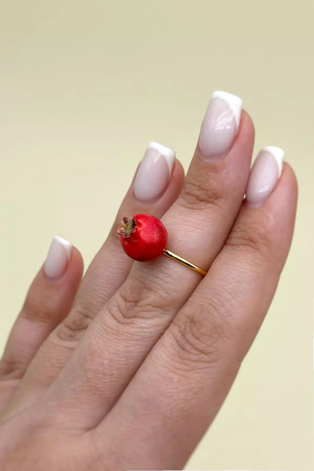 Pomegranate Rings Set featuring one ring with a pomegranate seed and another with a whole pomegranate by ioArtStudio