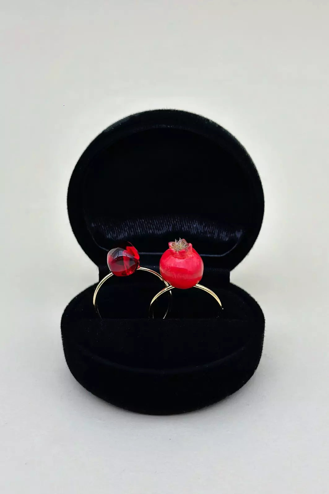 Pomegranate Rings Set featuring one ring with a pomegranate seed and another with a whole pomegranate by ioArtStudio