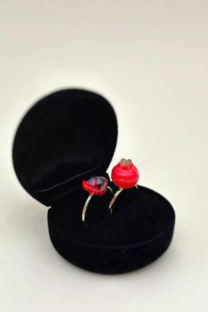 Pomegranate Rings Set featuring one ring with a pomegranate seed and another with a whole pomegranate by ioArtStudio