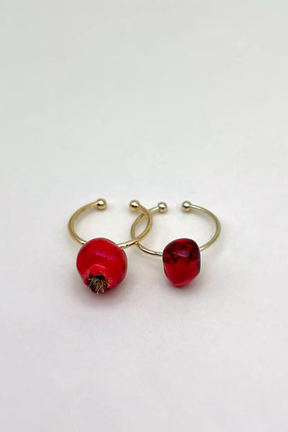 Pomegranate Rings Set featuring one ring with a pomegranate seed and another with a whole pomegranate by ioArtStudio