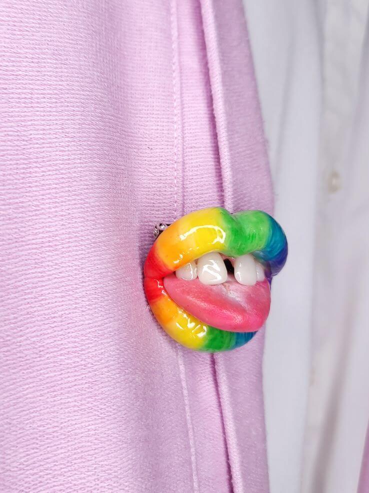 Rainbow Lips with Teeth Gap,  made with polymer clay and resin. A unique and eye-catching wearable art by ioArtStudio 