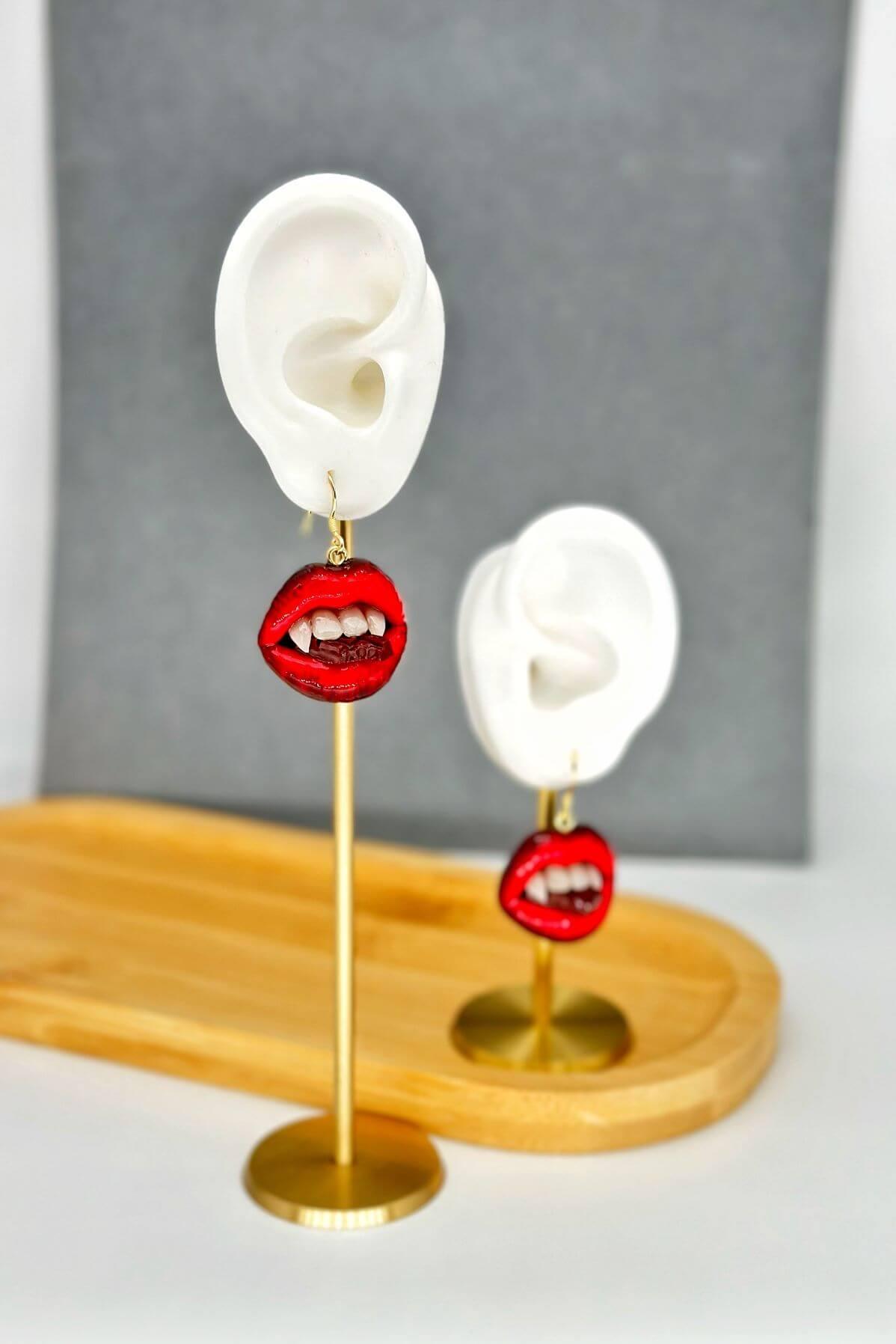 Red ombre lips with  Vampire Teeth  made with polymer clay and resin. A unique and eye-catching wearable art by ioArtStudio 