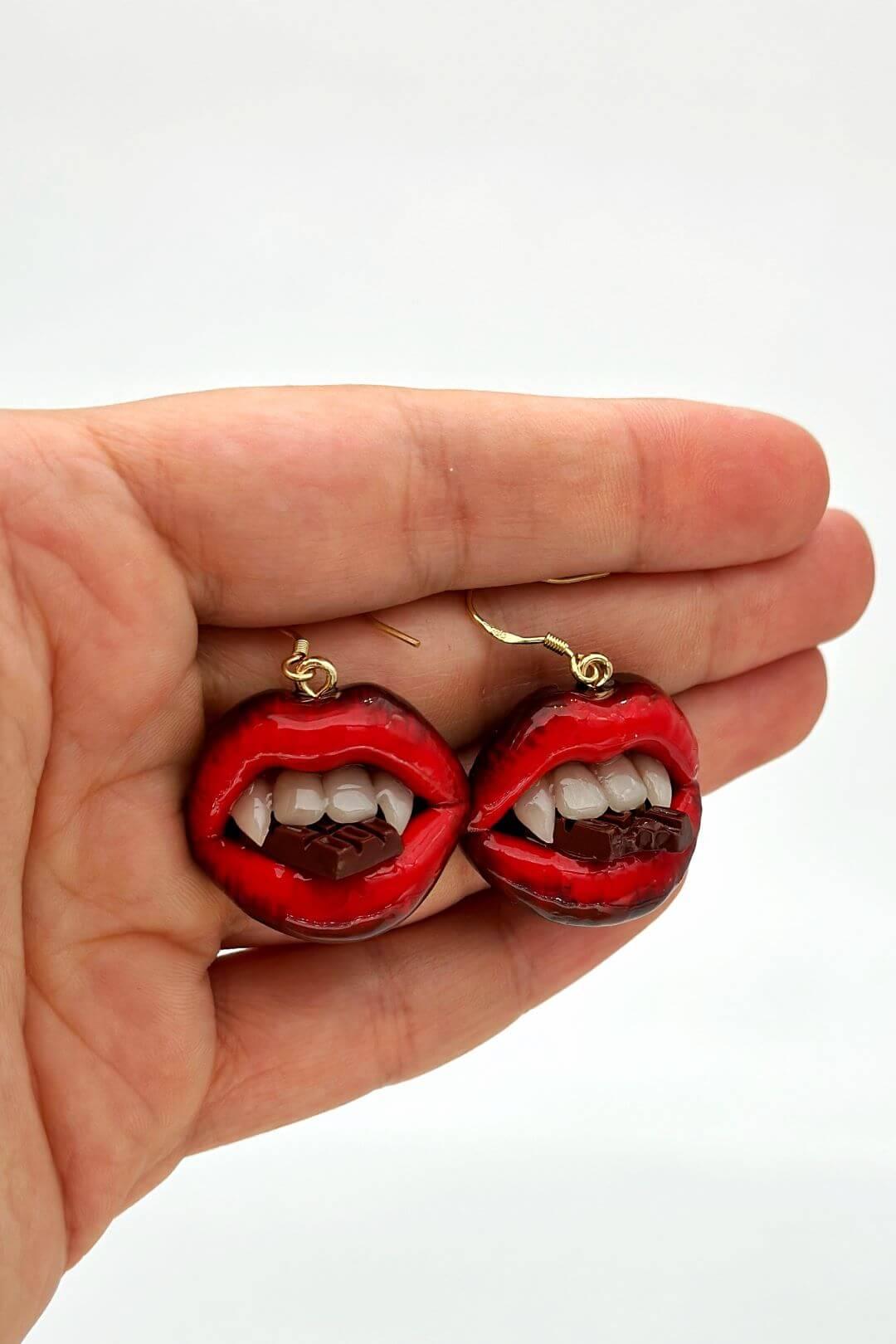 Red ombre lips with  Vampire Teeth  made with polymer clay and resin. A unique and eye-catching wearable art by ioArtStudio 