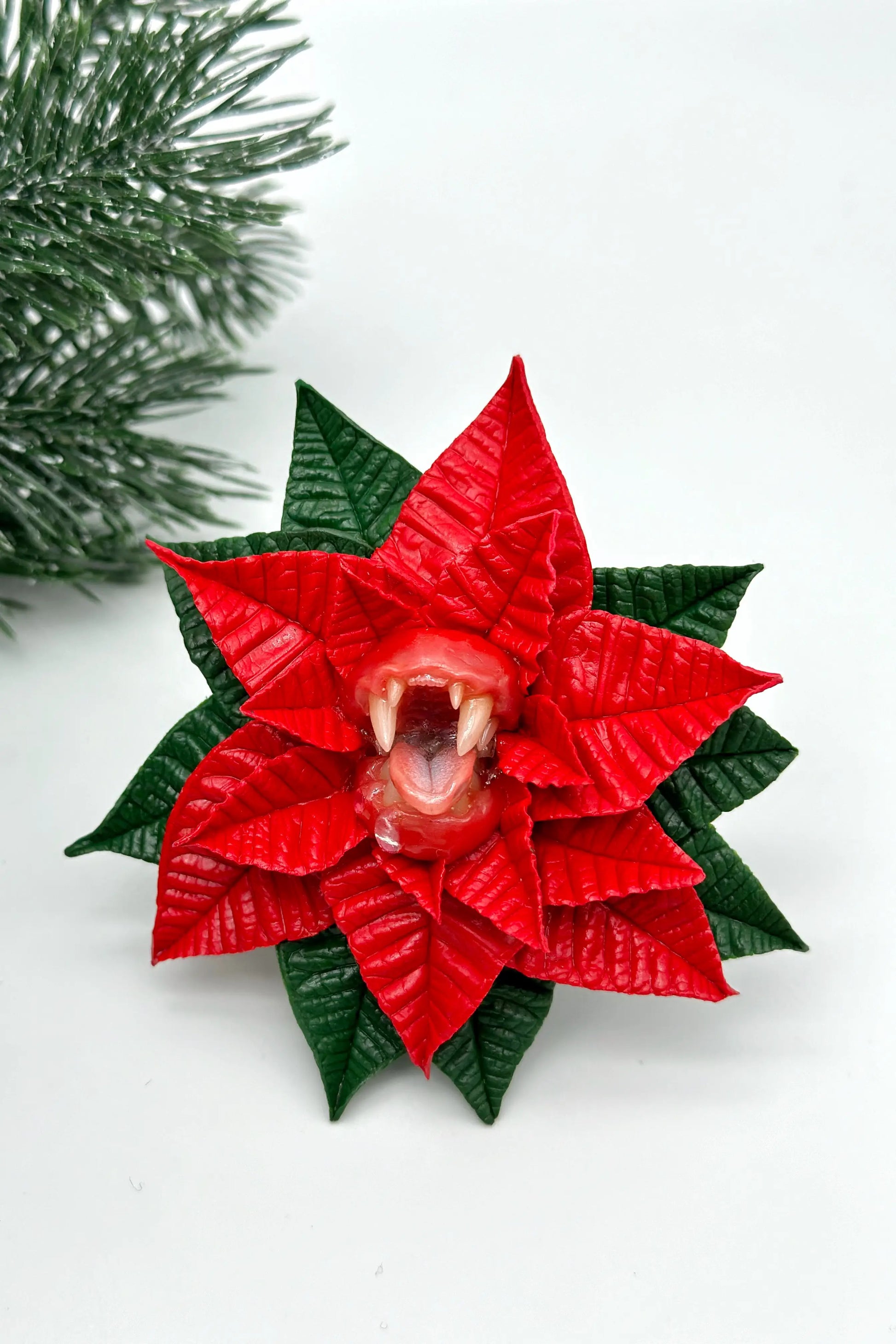 Red Poinsettia With Sharp Teeth  handmade jewelry with polymer clay by ioArtStudio 