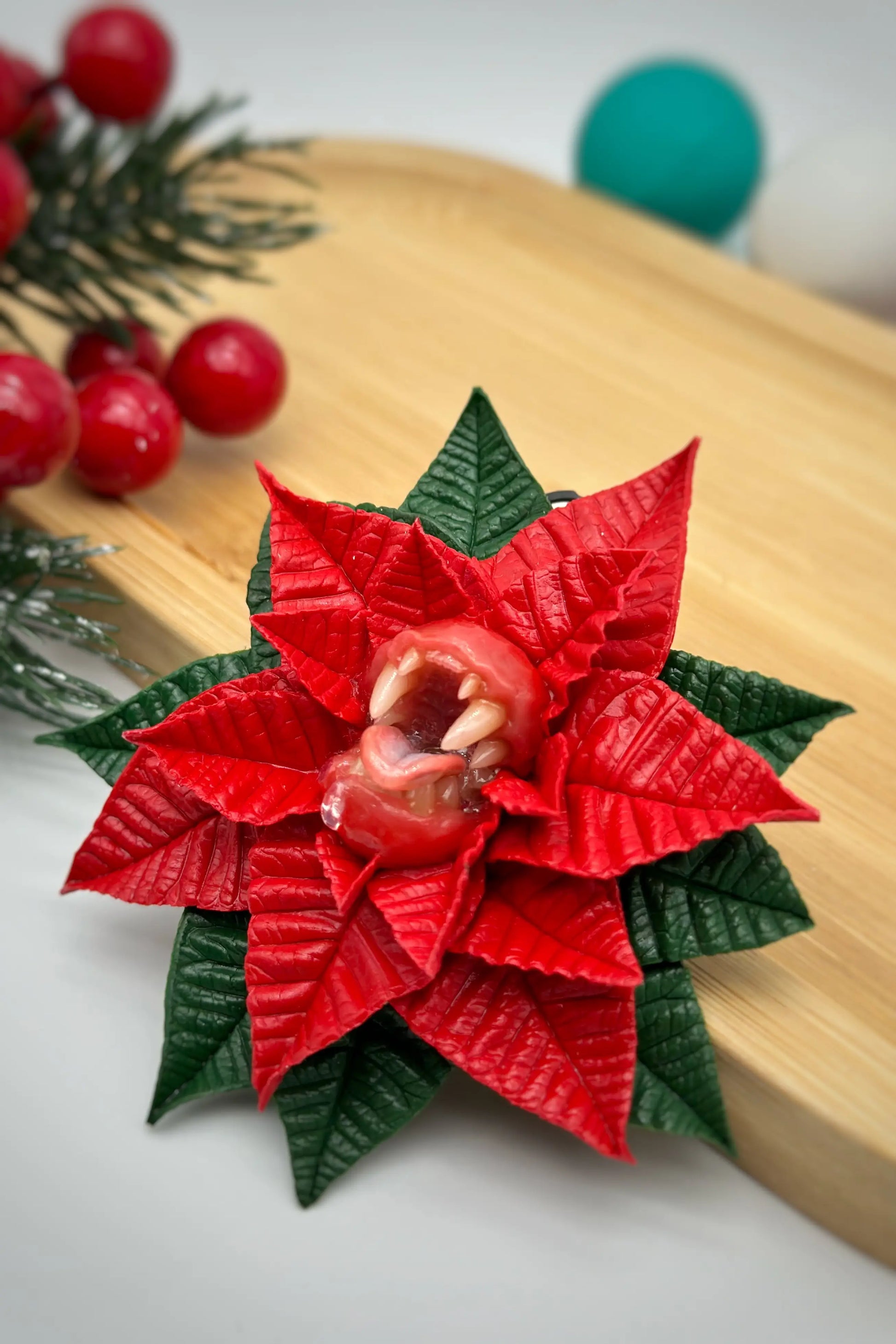 Red Poinsettia With Sharp Teeth  handmade jewelry with polymer clay by ioArtStudio 