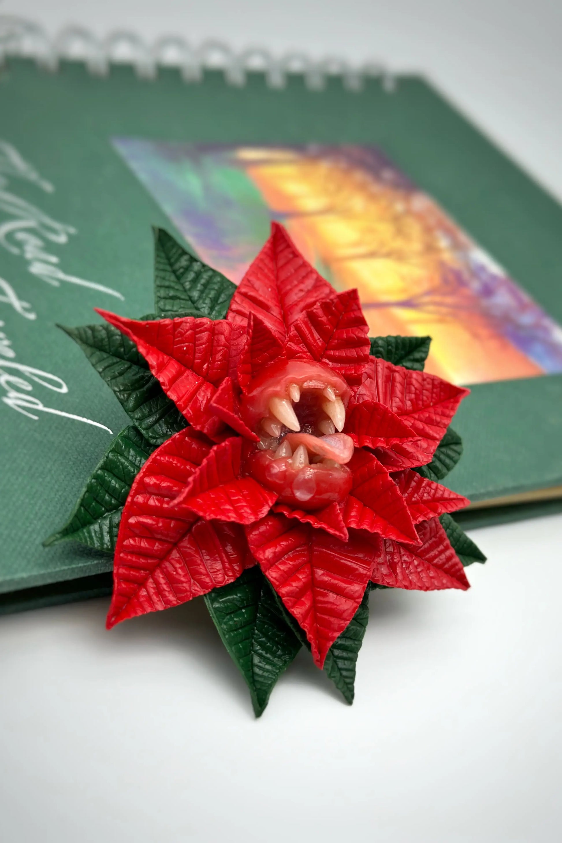 Red Poinsettia With Sharp Teeth  handmade jewelry with polymer clay by ioArtStudio 