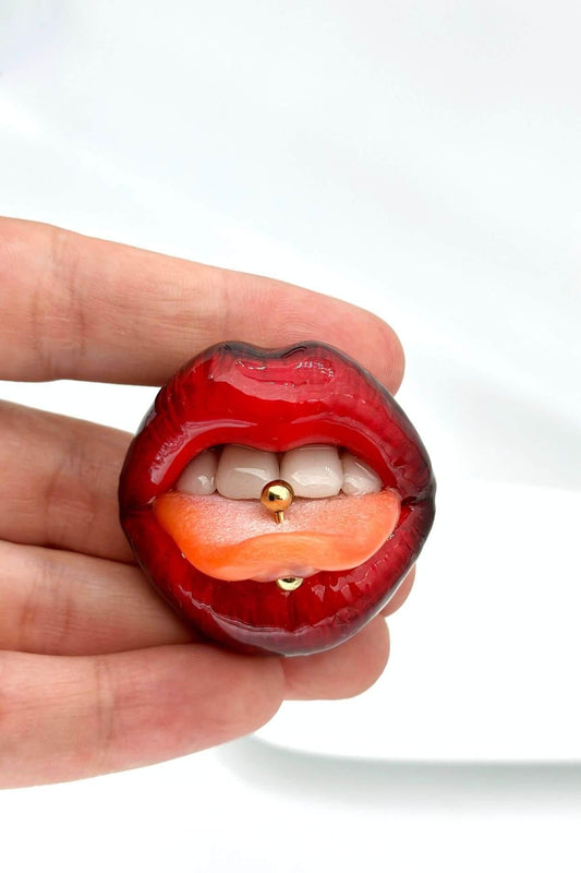 Red ombre lips with gold tongue ring  made with polymer clay and resin. A unique and eye-catching wearable art by ioArtStudio 