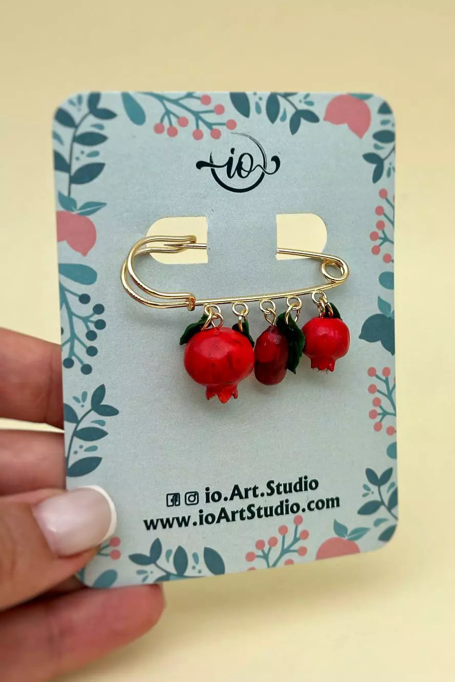 Safety Pin Pomegranate  handmade  wearable art piece, crafted from polymer clay and epoxy resin  by ioArtStudio