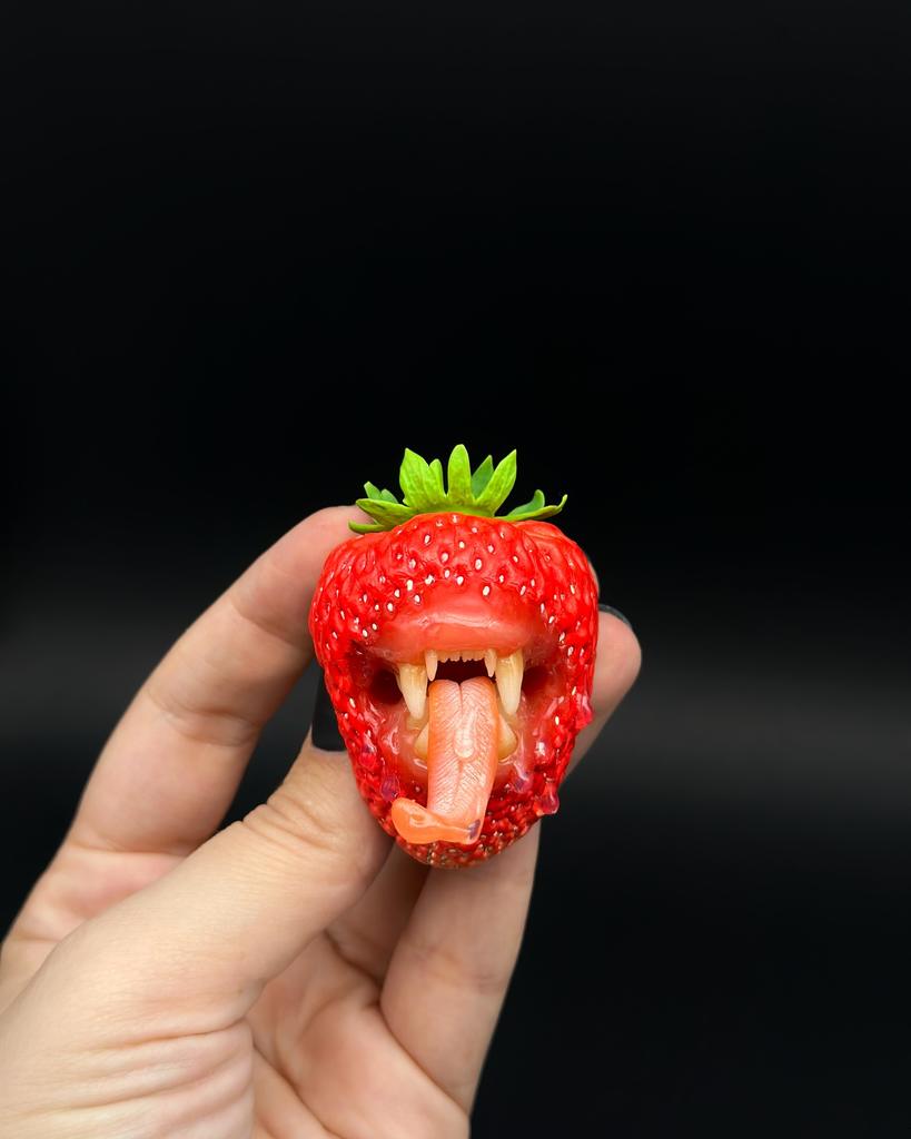 Wild Strawberry With Tiger Teeth sculpted with polymer clay. A unique and eye-catching wearable art by ioArtStudio 