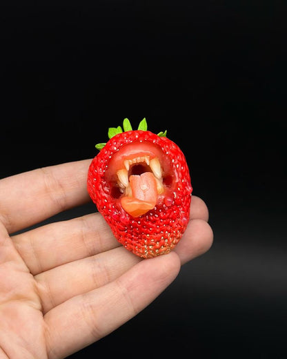 Wild Strawberry With Tiger Teeth sculpted with polymer clay. A unique and eye-catching wearable art by ioArtStudio 