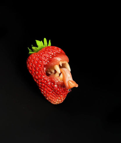 Wild Strawberry With Tiger Teeth sculpted with polymer clay. A unique and eye-catching wearable art by ioArtStudio 