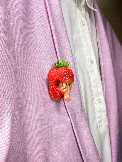 Wild Strawberry With Tiger Teeth sculpted with polymer clay. A unique and eye-catching wearable art by ioArtStudio 