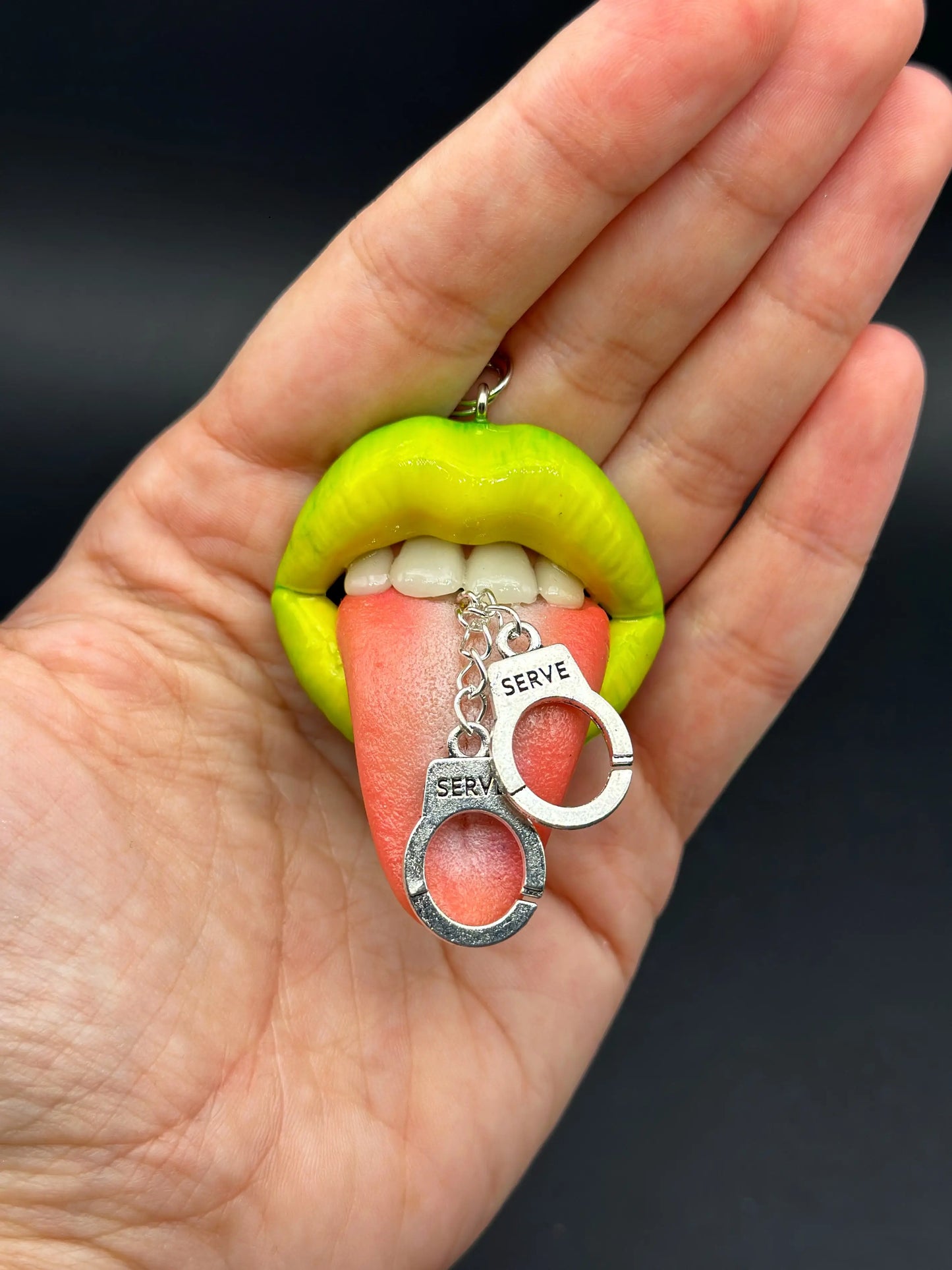 Chartreuse Yellow Lips With tiny Handcuffs, handmade wearable art piece by ioArtStudio