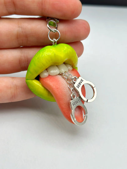 Chartreuse Yellow Lips With tiny Handcuffs, handmade wearable art piece by ioArtStudio